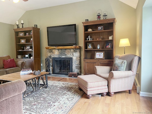 1040 Purchase Brook Rd, Southbury, CT 06488 - living area featuring vaulted ceiling, wood finished floors, a fireplace, and baseboard heating