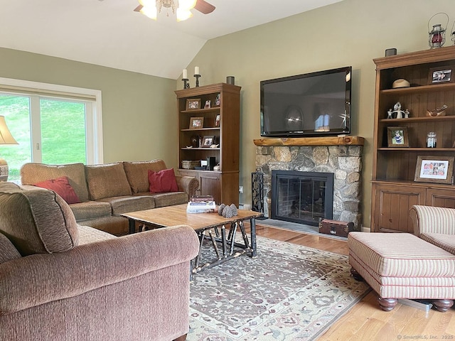 1040 Purchase Brook Rd, Southbury, CT 06488 - living area with ceiling fan, wood finished floors, a stone fireplace, and lofted ceiling