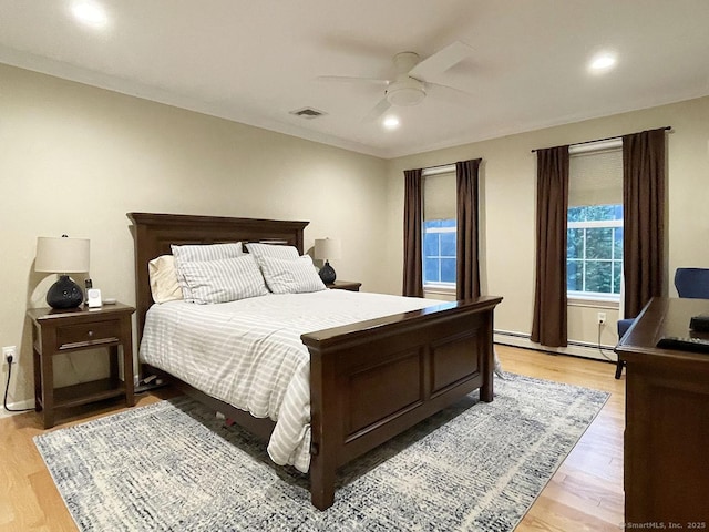 1040 Purchase Brook Rd, Southbury, CT 06488 - bedroom featuring a baseboard heating unit, light wood-type flooring, a ceiling fan, and recessed lighting
