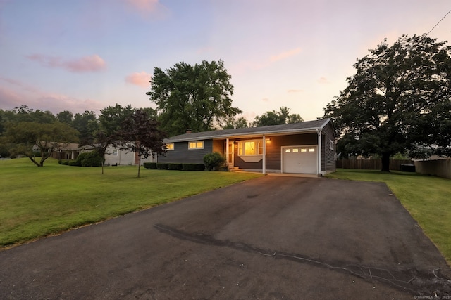 24 Westerly Dr, Enfield, CT 06082 - view of front of property featuring a garage and driveway