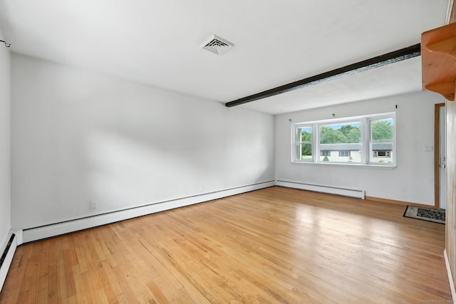 24 Westerly Dr, Enfield, CT 06082 - spare room with a baseboard heating unit, wood finished floors, and beam ceiling