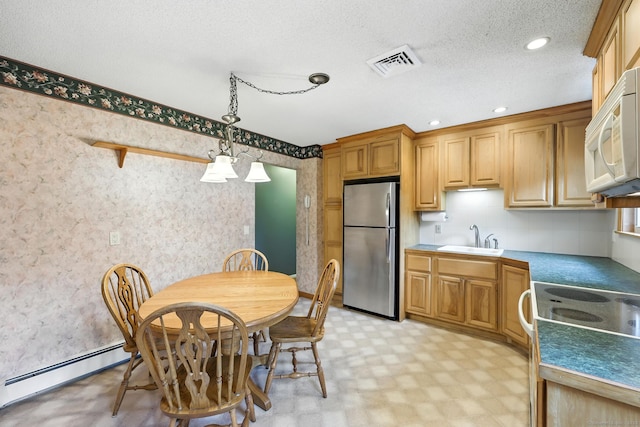 24 Westerly Dr, Enfield, CT 06082 - kitchen with white appliances, light flooring, decorative light fixtures, a textured ceiling, and wallpapered walls