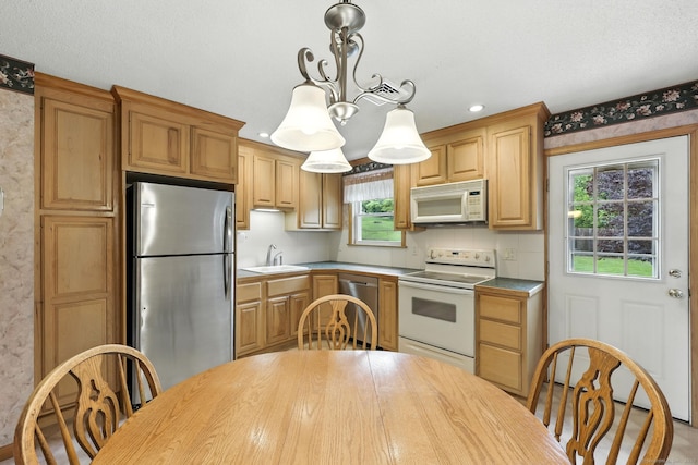 24 Westerly Dr, Enfield, CT 06082 - kitchen featuring appliances with stainless steel finishes, healthy amount of natural light, pendant lighting, recessed lighting, and light brown cabinetry