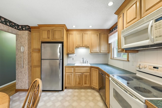 24 Westerly Dr, Enfield, CT 06082 - kitchen with stainless steel appliances, light floors, and recessed lighting