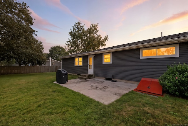 24 Westerly Dr, Enfield, CT 06082 - back of property at dusk featuring a patio