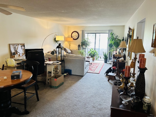 40 California St Unit A17, Stratford, CT 06615 - living room featuring carpet flooring, an office area, a textured ceiling, and a ceiling fan