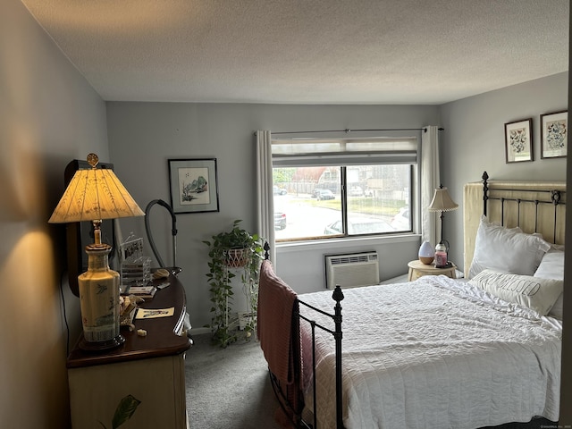 40 California St Unit A17, Stratford, CT 06615 - bedroom featuring carpet flooring, a wall mounted AC, and a textured ceiling