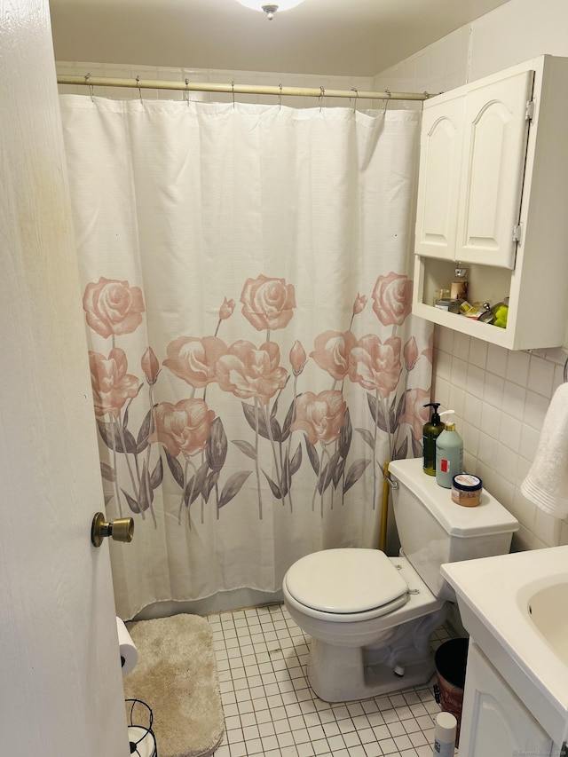 40 California St Unit A17, Stratford, CT 06615 - bathroom featuring vanity, tile patterned floors, and curtained shower