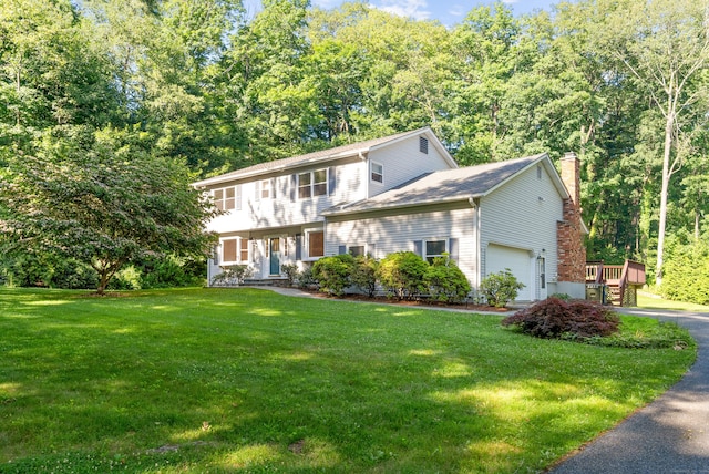 59 Judith Dr, Danbury, CT 06811 - colonial home featuring a chimney, an attached garage, a front lawn, and driveway