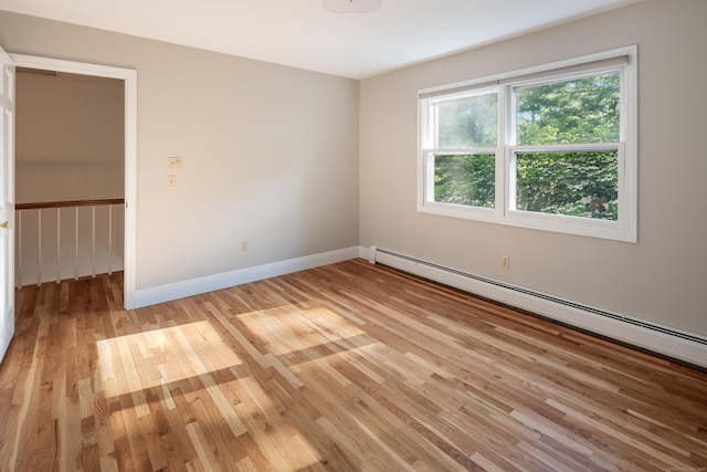 59 Judith Dr, Danbury, CT 06811 - spare room with baseboard heating and light wood-type flooring