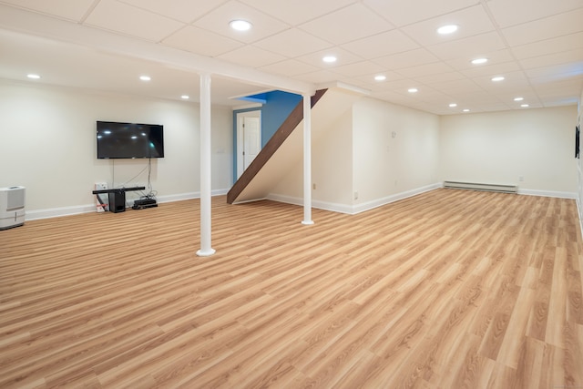 59 Judith Dr, Danbury, CT 06811 - finished below grade area featuring baseboard heating, light wood-style flooring, recessed lighting, and a paneled ceiling