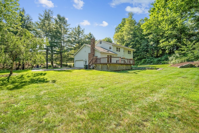 59 Judith Dr, Danbury, CT 06811 - view of green lawn with a deck