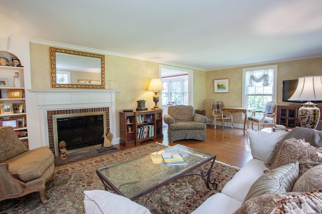 23 Mountain View Dr, West Hartford, CT 06117 - living area with ornamental molding, wood finished floors, and a fireplace