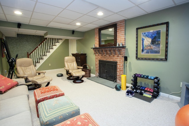 23 Mountain View Dr, West Hartford, CT 06117 - living area with carpet, stairway, a brick fireplace, and a drop ceiling