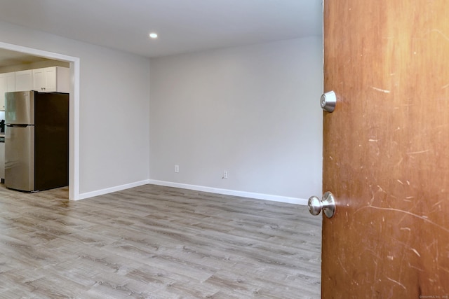 56 Wakelee Avenue Ext Unit 12, Shelton, CT 06484 - empty room featuring light wood-style flooring and recessed lighting