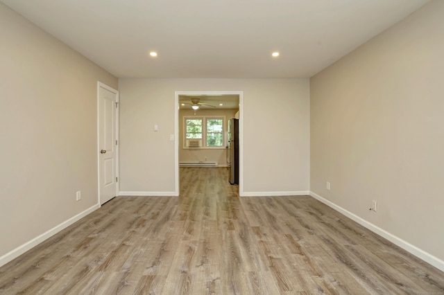 56 Wakelee Avenue Ext Unit 12, Shelton, CT 06484 - spare room featuring light wood-type flooring, recessed lighting, a ceiling fan, and a baseboard radiator