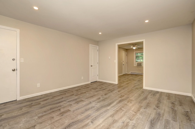 56 Wakelee Avenue Ext Unit 12, Shelton, CT 06484 - spare room with a baseboard radiator, recessed lighting, wood finished floors, and ceiling fan
