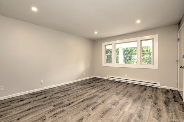 56 Wakelee Avenue Ext Unit 12, Shelton, CT 06484 - empty room with baseboard heating, recessed lighting, and wood finished floors