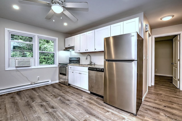 56 Wakelee Avenue Ext Unit 12, Shelton, CT 06484 - kitchen featuring appliances with stainless steel finishes, cooling unit, under cabinet range hood, wood finished floors, and recessed lighting