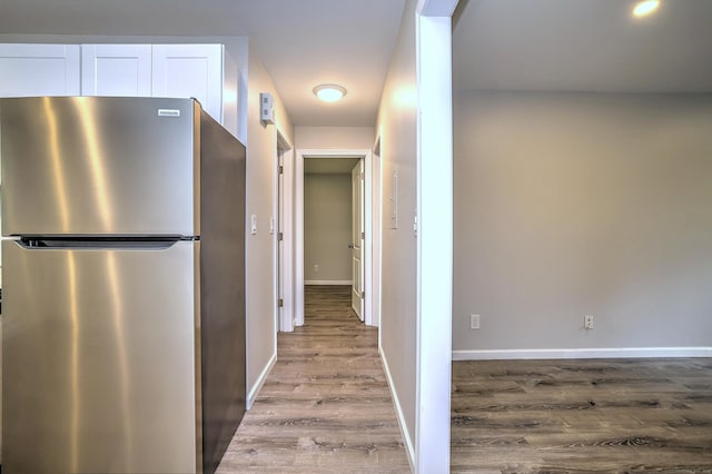 56 Wakelee Avenue Ext Unit 12, Shelton, CT 06484 - hallway featuring wood finished floors and baseboards