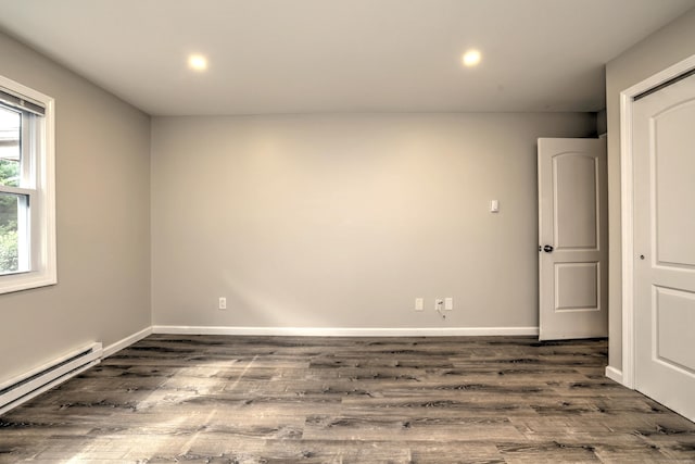 56 Wakelee Avenue Ext Unit 12, Shelton, CT 06484 - unfurnished room featuring baseboard heating, dark wood-style flooring, and recessed lighting