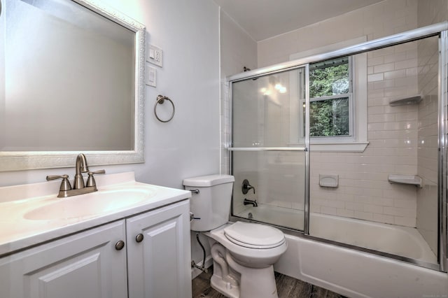 56 Wakelee Avenue Ext Unit 12, Shelton, CT 06484 - bathroom featuring vanity, shower / bath combination with glass door, and wood finished floors
