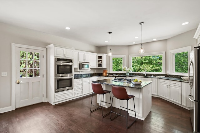 168 Sunset Hill Rd, Redding, CT 06896 - kitchen featuring plenty of natural light, stainless steel appliances, white cabinetry, a breakfast bar, and recessed lighting