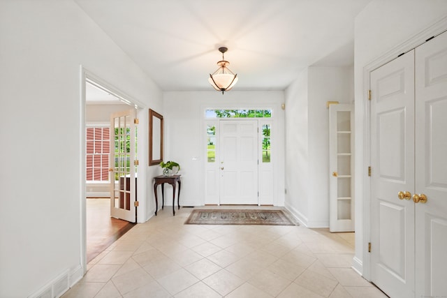 168 Sunset Hill Rd, Redding, CT 06896 - foyer with plenty of natural light and light tile patterned flooring