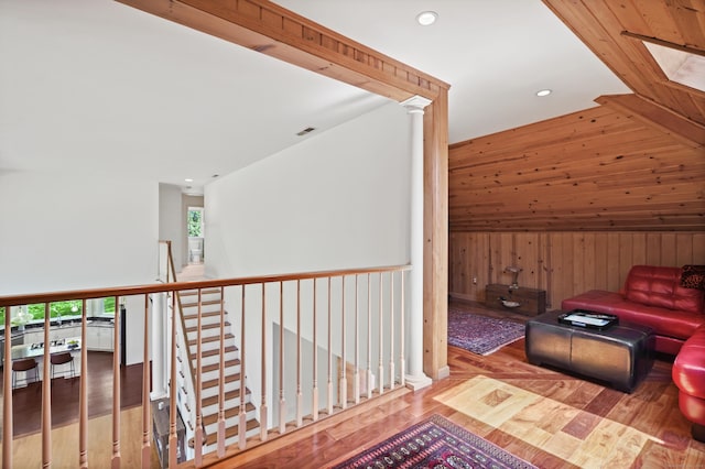 168 Sunset Hill Rd, Redding, CT 06896 - hallway featuring wood walls, wood finished floors, recessed lighting, and an upstairs landing