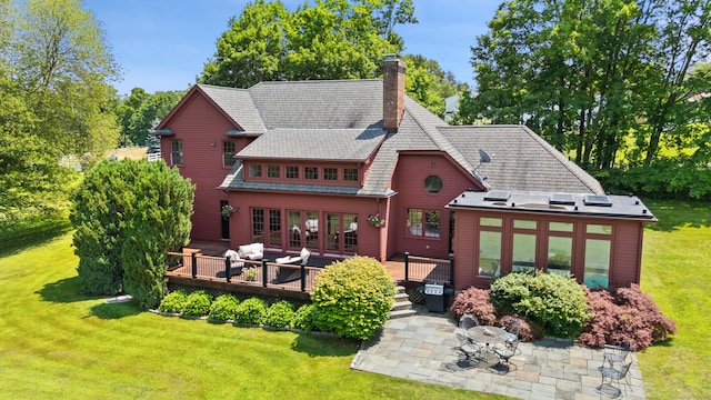 168 Sunset Hill Rd, Redding, CT 06896 - rear view of house with a deck, a yard, a chimney, and a patio