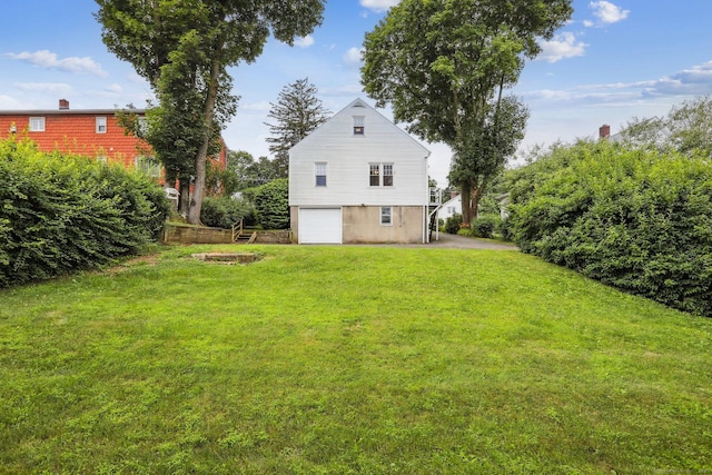 9 Fairfield Ave, Danbury, CT 06810 - view of green lawn featuring a garage and driveway
