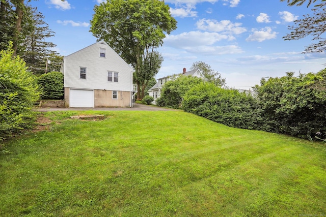 9 Fairfield Ave, Danbury, CT 06810 - view of grassy yard with driveway and a garage
