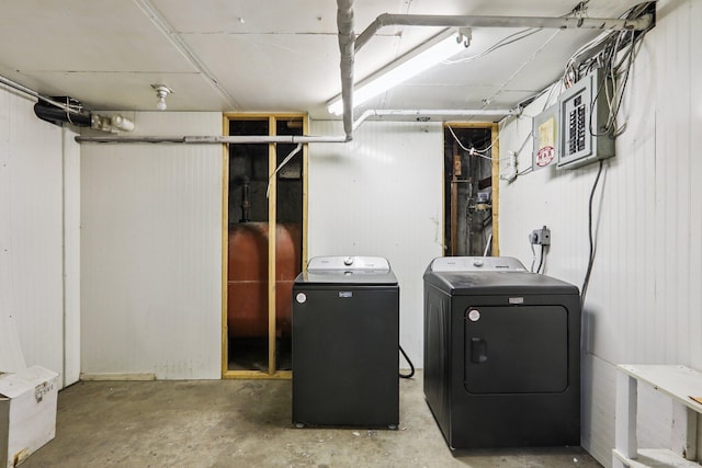 9 Fairfield Ave, Danbury, CT 06810 - laundry room featuring washer and clothes dryer, oil tank, and electric panel
