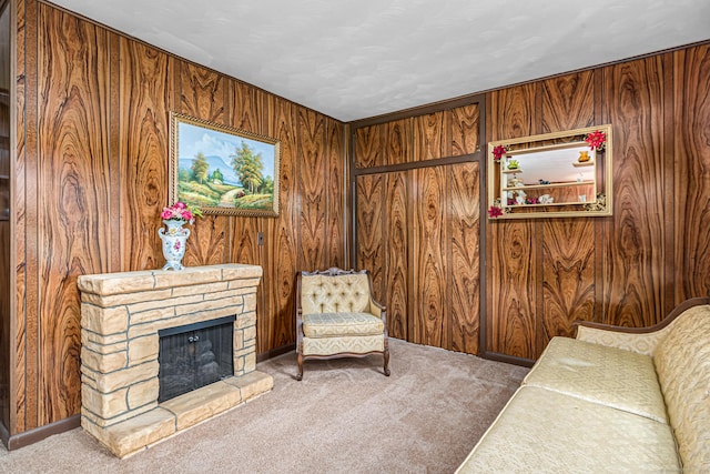7 Weymouth Dr, Enfield, CT 06082 - carpeted living area featuring wooden walls and a fireplace