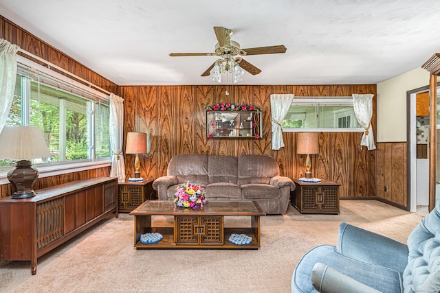 7 Weymouth Dr, Enfield, CT 06082 - living room featuring wooden walls, carpet flooring, and a ceiling fan