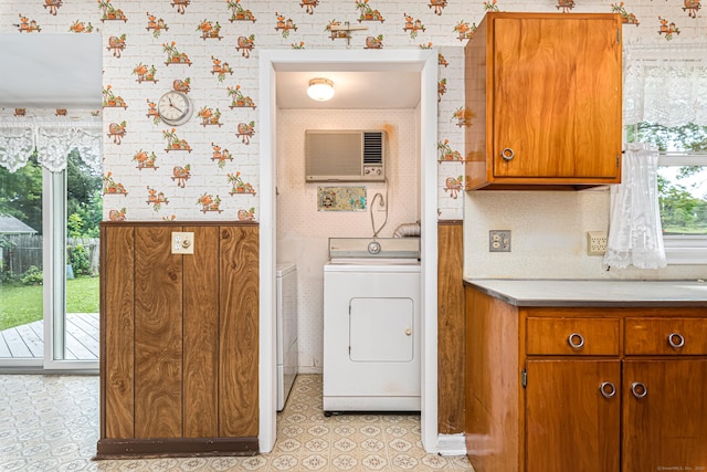 7 Weymouth Dr, Enfield, CT 06082 - laundry room featuring wallpapered walls, a wall mounted AC, and washer and dryer