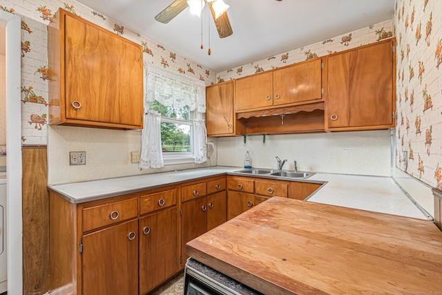 7 Weymouth Dr, Enfield, CT 06082 - kitchen with wallpapered walls, light countertops, ceiling fan, and brown cabinets