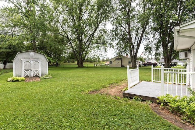 7 Weymouth Dr, Enfield, CT 06082 - view of yard featuring a storage unit and a wooden deck