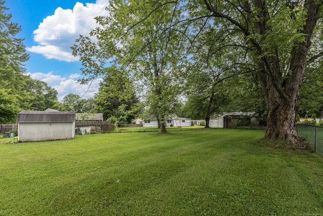 7 Weymouth Dr, Enfield, CT 06082 - fenced backyard with a shed
