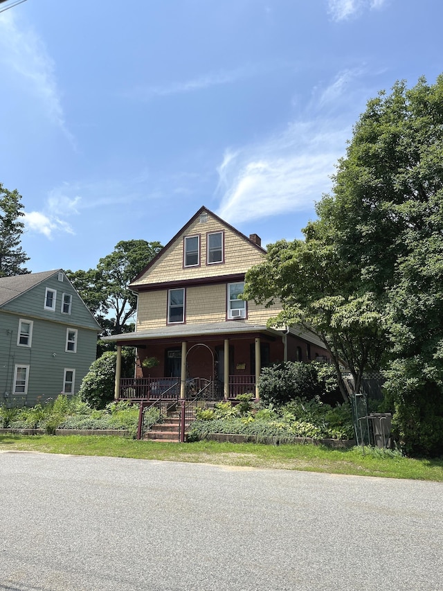 240 Walnut St, Windham, CT 06226 - view of front of property with covered porch and a chimney