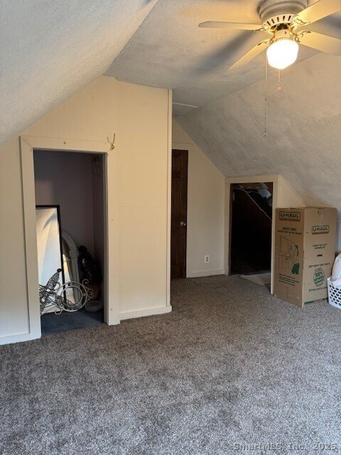 240 Walnut St, Windham, CT 06226 - additional living space featuring a textured ceiling, lofted ceiling, carpet flooring, and ceiling fan