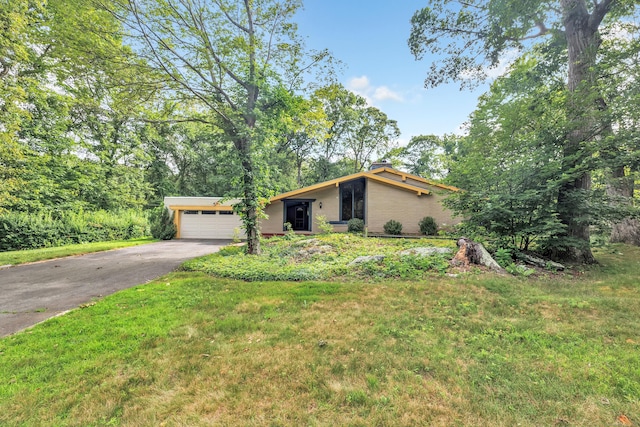 3 Yale Ave, Shelton, CT 06484 - mid-century inspired home featuring driveway, an attached garage, and a front yard
