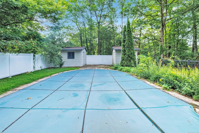 3 Yale Ave, Shelton, CT 06484 - view of pool with a storage shed and a fenced backyard
