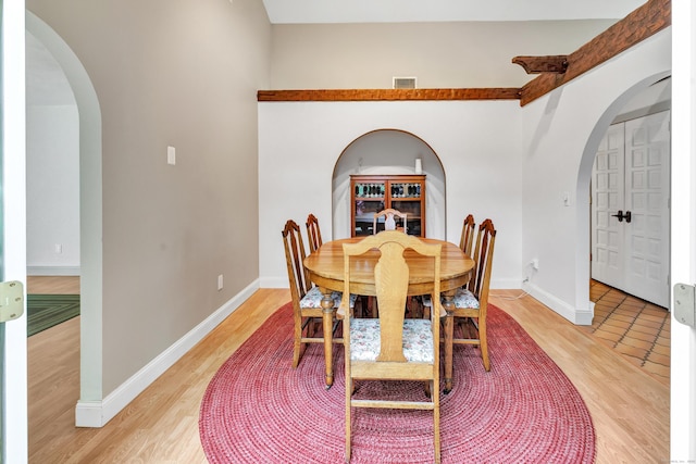 3 Yale Ave, Shelton, CT 06484 - dining room featuring arched walkways and light wood-style flooring