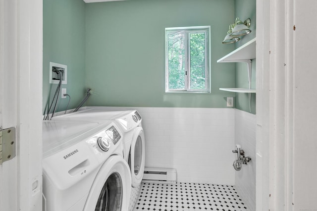 3 Yale Ave, Shelton, CT 06484 - laundry room featuring washing machine and clothes dryer, baseboard heating, wainscoting, and tile walls