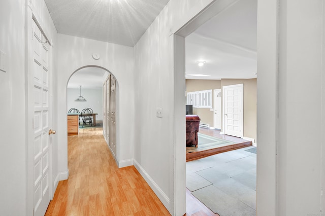 3 Yale Ave, Shelton, CT 06484 - corridor with arched walkways and light wood-style floors