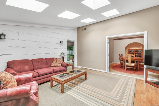 3 Yale Ave, Shelton, CT 06484 - living area with a skylight and light wood-style flooring