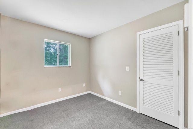 3 Yale Ave, Shelton, CT 06484 - unfurnished bedroom with dark carpet and a closet