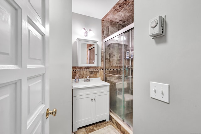 3 Yale Ave, Shelton, CT 06484 - bathroom featuring vanity, a stall shower, and tile walls