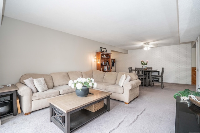 506 Twin Circle Dr Unit 506, South Windsor, CT 06074 - living area with ceiling fan, brick wall, and light colored carpet